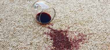 spilled wine on white carpet
